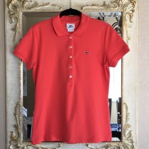 Lacoste polo. 5-button. Salmon orange.42 (US L/10)